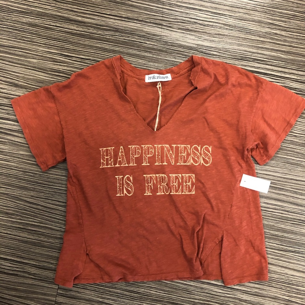 Rust colored tee Available in S or M